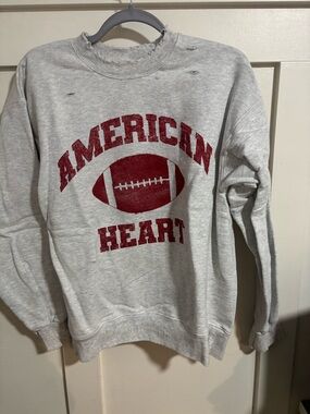 Benson Boone Reason Light Gray Sweatshirt with Red Football Graphic